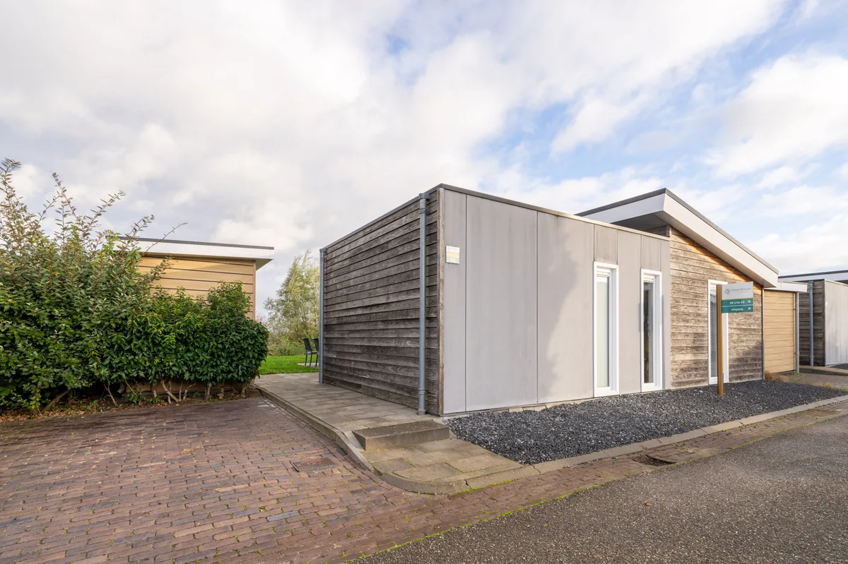 Ravenbosch met open haard, tuinhuis en sauna